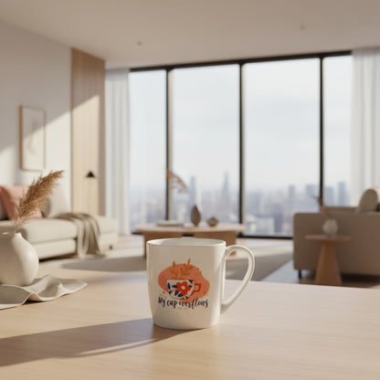 White mug with floral design and text on a white surface