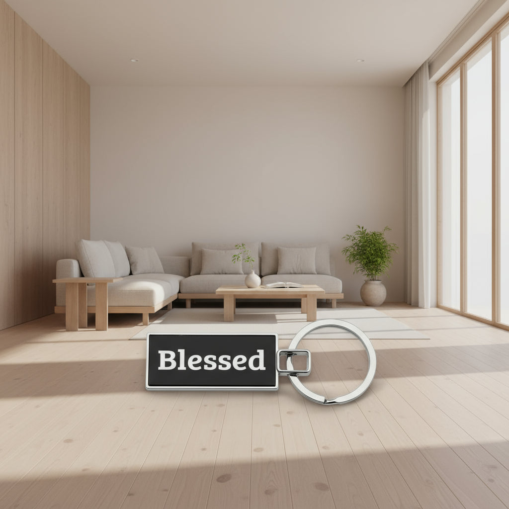 Keychain with 'Blessed' text on a patterned background