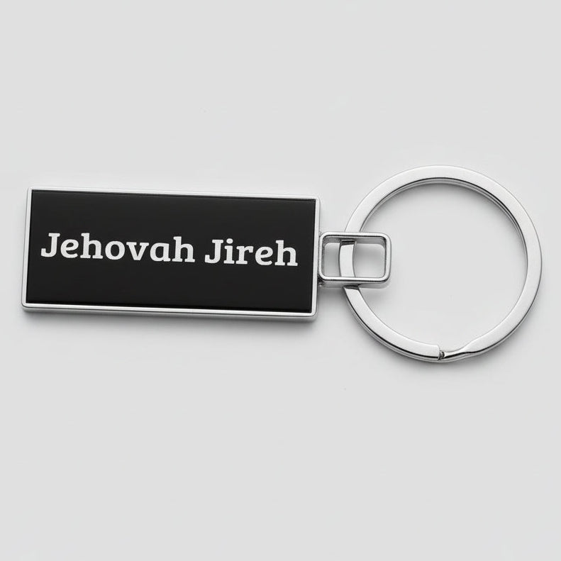 Keychain with 'Jehovah Jireh' text on a black background