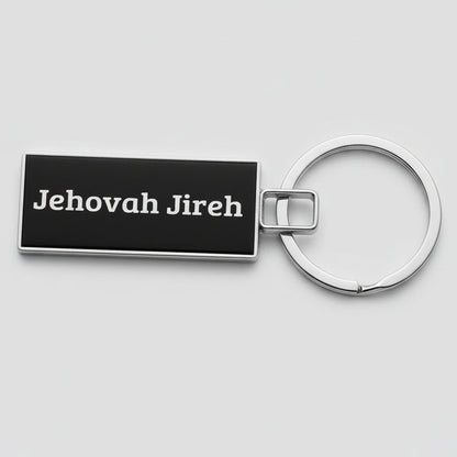 Keychain with 'Jehovah Jireh' text on a black background