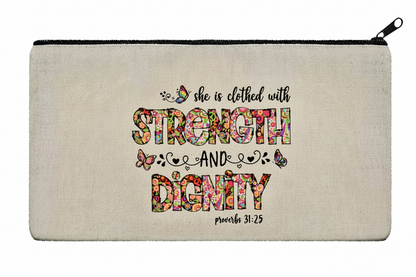 Canvas pouch with motivational quote 'She is clothed with strength and dignity' on a plain background