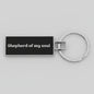 Keychain with 'Shepherd of my soul' text on a gray background